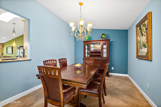 dining area featuring lofted ceiling, a chandelier, and light tile patterned floors