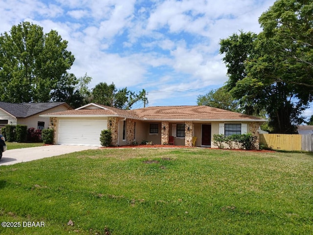 single story home featuring an attached garage, concrete driveway, fence, and a front lawn