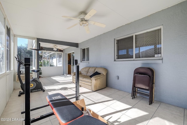 74 Fulton Pl, Palm Coast, FL 32137 - exercise area with a ceiling fan, tile patterned floors, and a textured wall