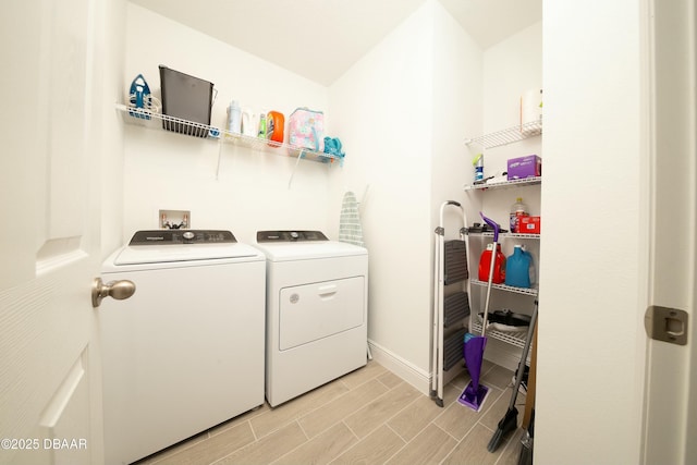 129 Lost Ball Dr, Daytona Beach, FL 32124 - laundry room with washing machine and clothes dryer and wood tiled floors