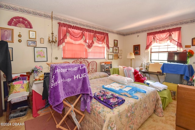 bedroom featuring carpet