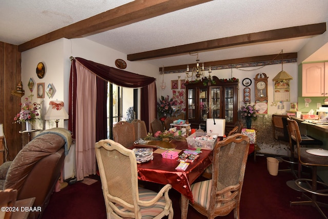 dining area with beamed ceiling and a textured ceiling