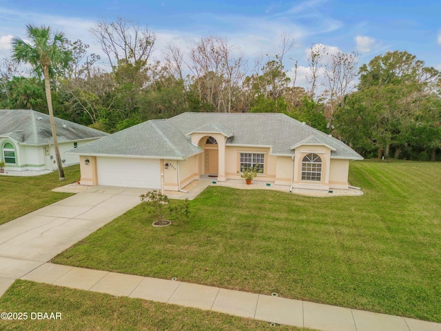 view of front of home with a front lawn and a garage