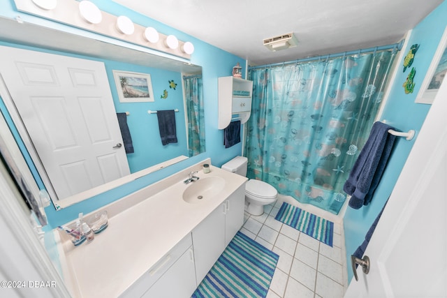 full bathroom featuring toilet, vanity, shower / bath combination with curtain, and tile patterned floors