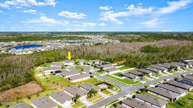 aerial view with a residential view and a water view