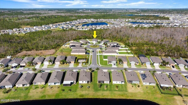 aerial view featuring a residential view and a water view