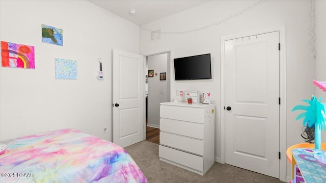 bedroom featuring visible vents