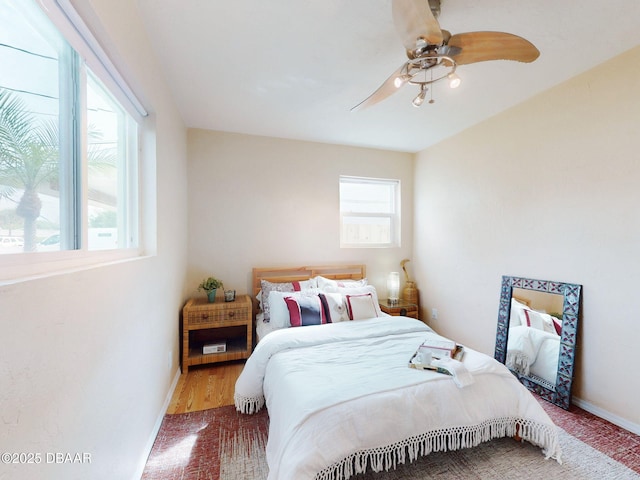 823 E 10th Ave, New Smyrna Beach, FL 32169 - bedroom with a ceiling fan and carpet floors