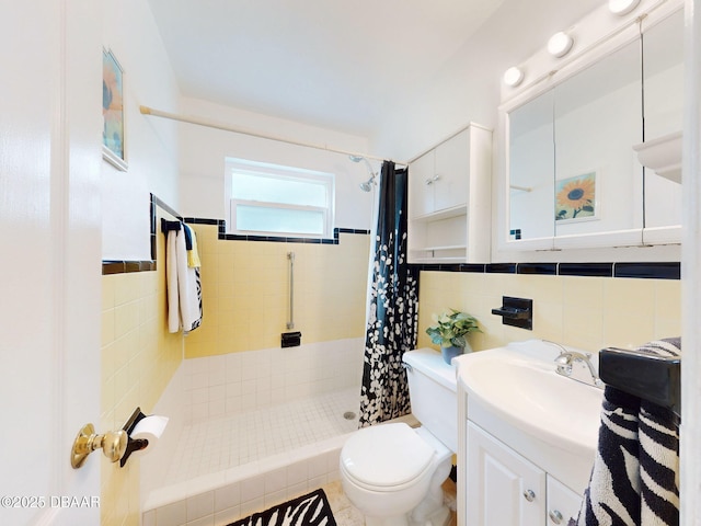 823 E 10th Ave, New Smyrna Beach, FL 32169 - bathroom with tile walls, vanity, and a tile shower