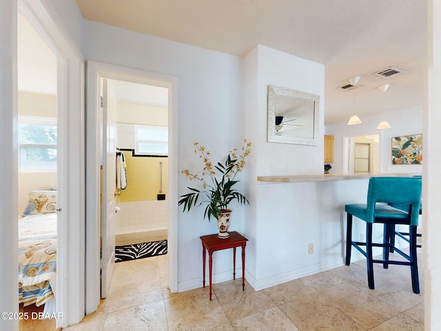 823 E 10th Ave, New Smyrna Beach, FL 32169 - corridor featuring healthy amount of natural light
