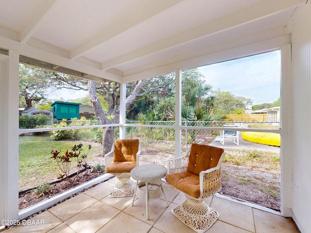 823 E 10th Ave, New Smyrna Beach, FL 32169 - sunroom featuring beam ceiling