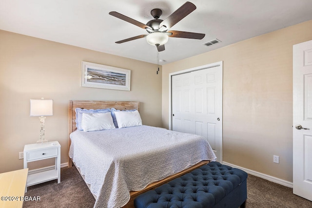 carpeted bedroom with a closet and ceiling fan