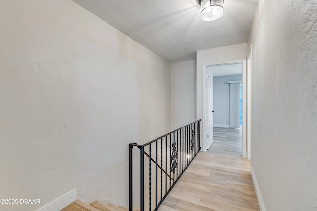 hallway featuring light wood-type flooring