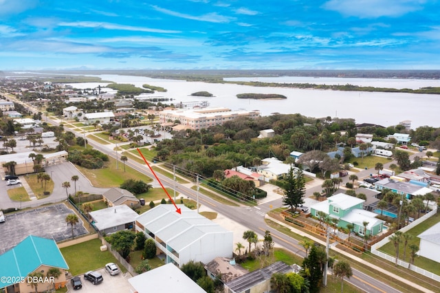 drone / aerial view featuring a water view