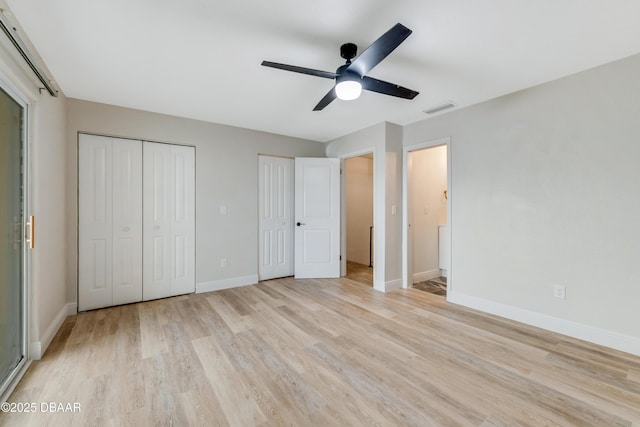 unfurnished bedroom featuring ceiling fan and light hardwood / wood-style floors