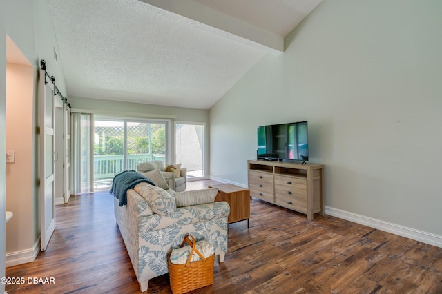 113 Club House Blvd, New Smyrna Beach, FL 32168 - living room with baseboards, a barn door, vaulted ceiling with beams, and wood finished floors