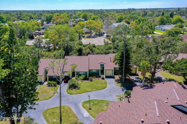 113 Club House Blvd, New Smyrna Beach, FL 32168 - drone / aerial view featuring a view of trees
