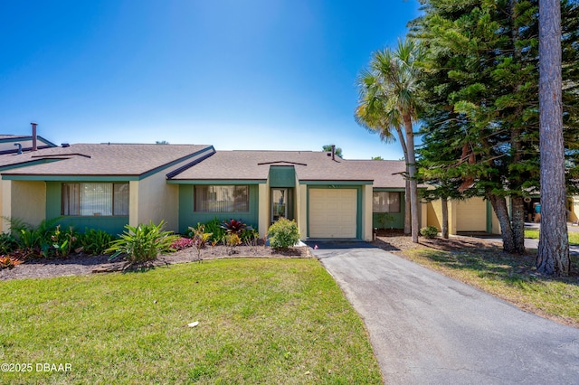 113 Club House Blvd, New Smyrna Beach, FL 32168 - ranch-style house with driveway, a garage, roof with shingles, and a front yard