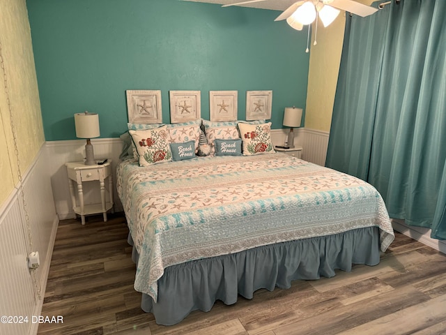 bedroom featuring hardwood / wood-style floors and ceiling fan