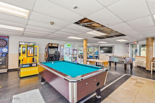 rec room featuring a wealth of natural light, a paneled ceiling, radiator, and billiards