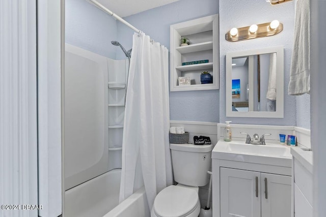 full bathroom with shower / bath combo with shower curtain, vanity, and toilet