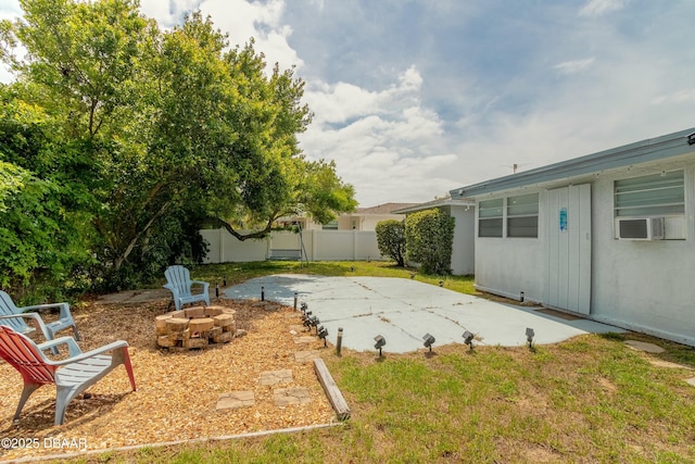 view of patio featuring a fire pit