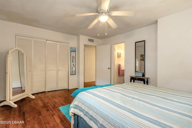 bedroom with ensuite bathroom, ceiling fan, a closet, and dark hardwood / wood-style floors