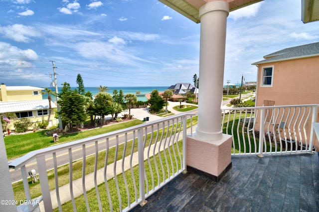 balcony featuring a water view