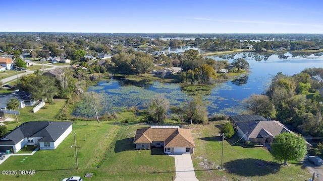 birds eye view of property featuring a water view