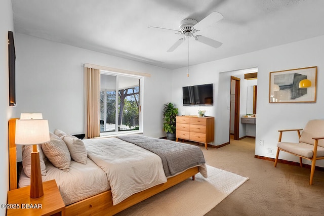 bedroom featuring light colored carpet, ceiling fan, and baseboards