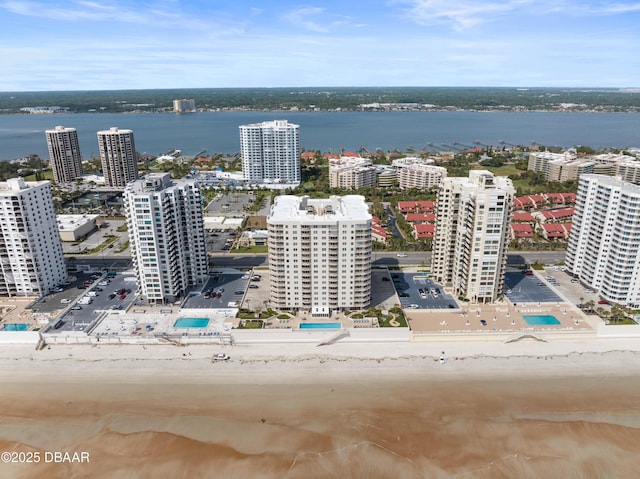 bird's eye view with a city view and a water view