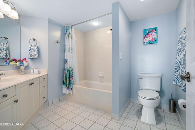 bathroom featuring tile patterned floors, baseboards, toilet, and vanity