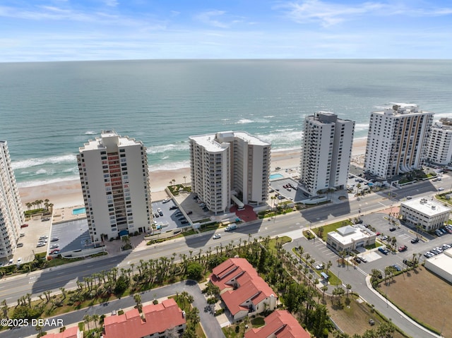 aerial view with a beach view and a water view