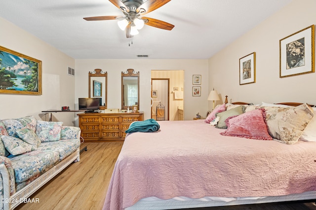 bedroom featuring ceiling fan and light hardwood / wood-style flooring