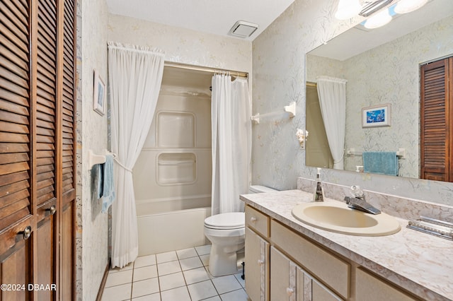 full bathroom featuring vanity, tile patterned floors, toilet, shower / bathtub combination with curtain, and a textured ceiling