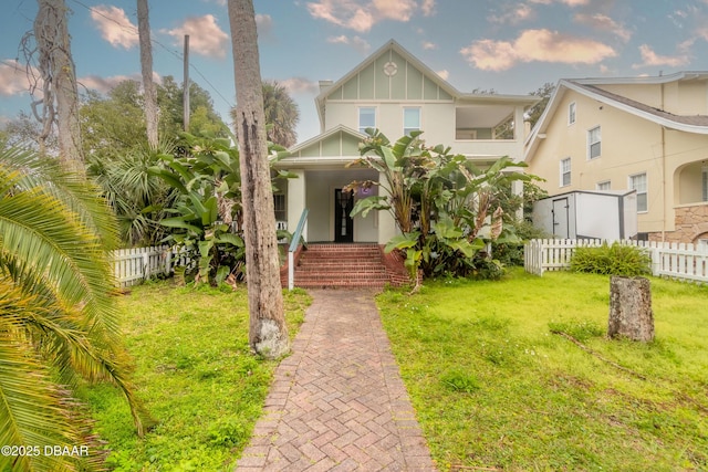 view of front of home with a front yard