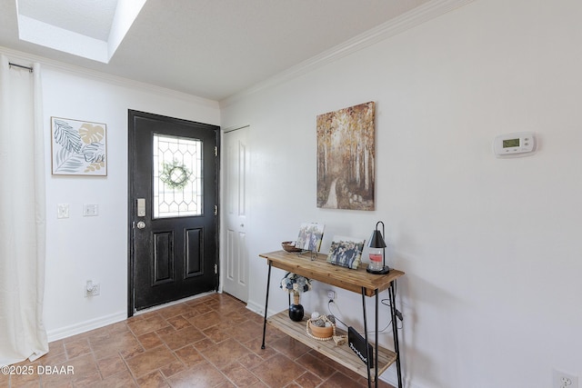 entryway featuring crown molding