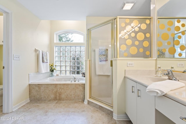 full bathroom featuring plus walk in shower, tile patterned floors, vanity, and toilet