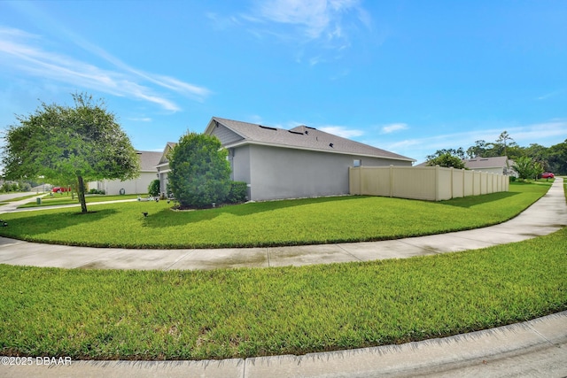 316 Nowell Loop, Deland, FL 32724 - view of property exterior featuring stucco siding