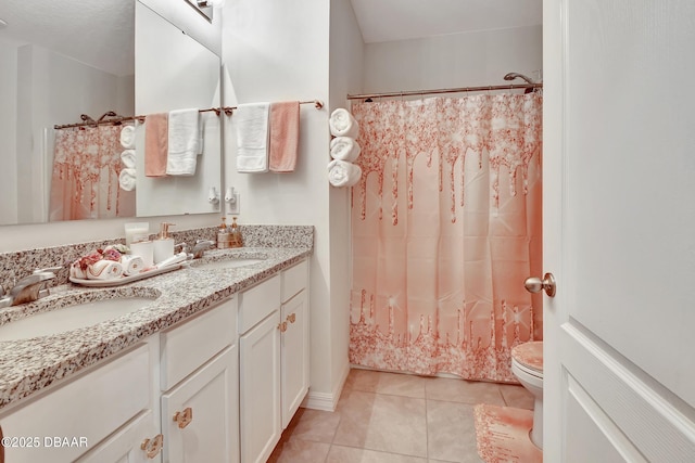 316 Nowell Loop, Deland, FL 32724 - bathroom featuring tile patterned floors, double vanity, toilet, and curtained shower