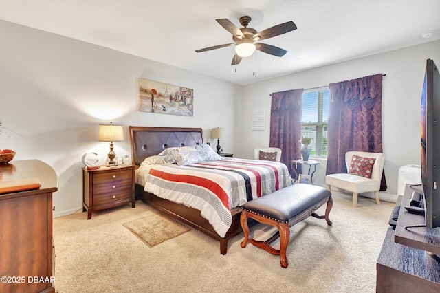 316 Nowell Loop, Deland, FL 32724 - bedroom with light colored carpet, a ceiling fan, and baseboards