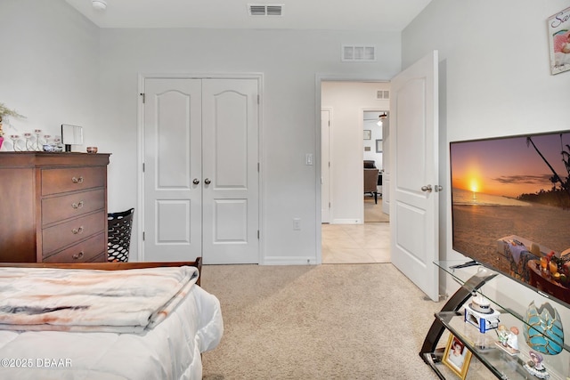 316 Nowell Loop, Deland, FL 32724 - bedroom with light carpet, a closet, and baseboards