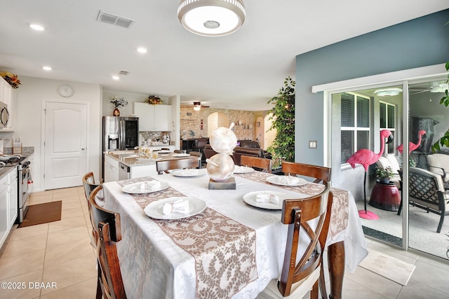 316 Nowell Loop, Deland, FL 32724 - dining area with light tile patterned floors, ceiling fan, and recessed lighting
