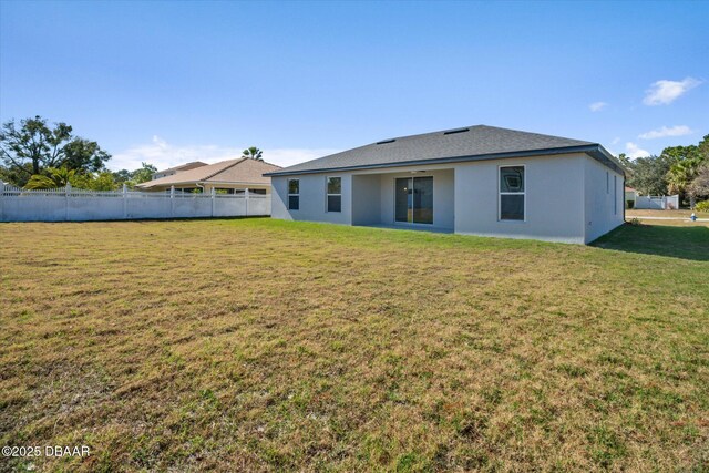 45 Fenhill Ln, Palm Coast, FL 32137 - back of property with stucco siding