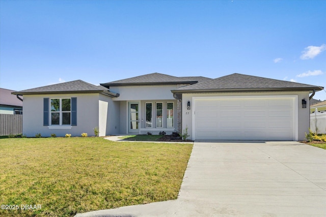 45 Fenhill Ln, Palm Coast, FL 32137 - prairie-style house featuring stucco siding, concrete driveway, and a garage