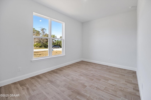 45 Fenhill Ln, Palm Coast, FL 32137 - empty room with light wood finished floors and baseboards
