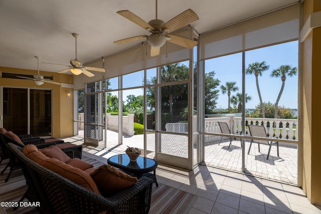 sunroom featuring tile patterned flooring