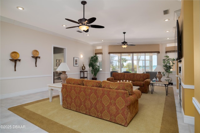 living room with recessed lighting, ceiling fan, crown molding, visible vents, and baseboards