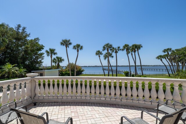 view of patio / terrace with a water view