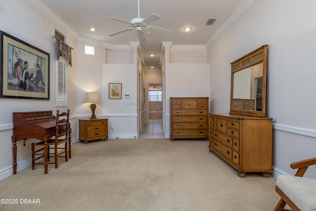living area with visible vents, a ceiling fan, ornamental molding, and light carpet
